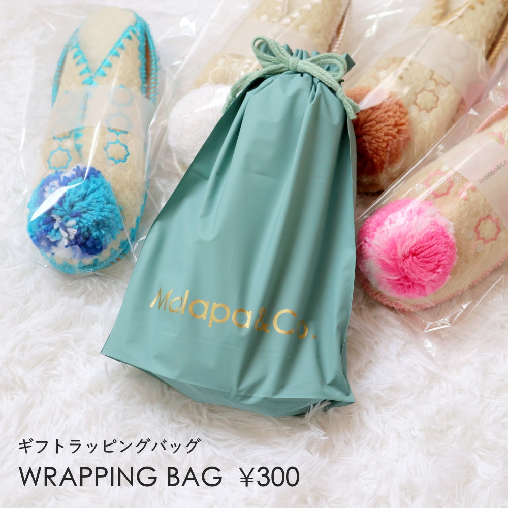 ウール×ボア ポンポンバブーシュ ブルー